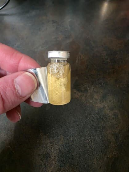 Contaminated steroid vial obtained during investigation